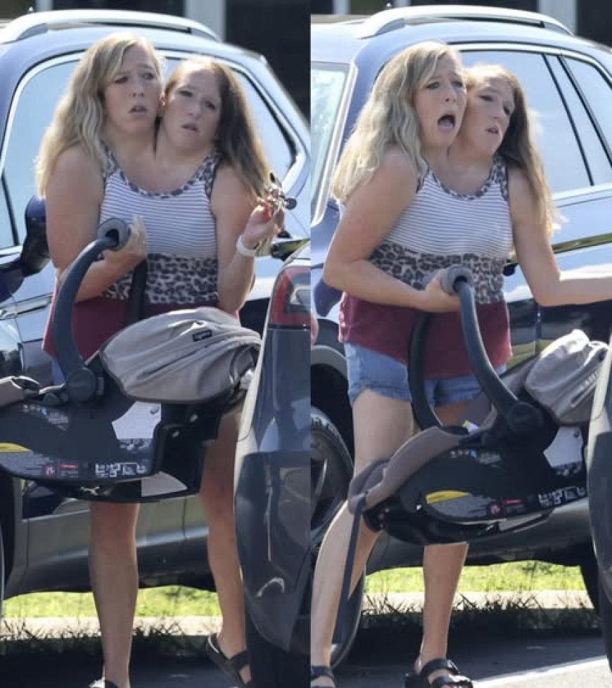 Gêmeas siamesas Abby e Brittany Hensel são vistas no McDonald’s acompanhadas de um recém-nascido